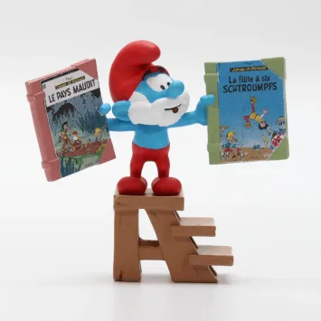 De Smurfen met een stripboeken kist