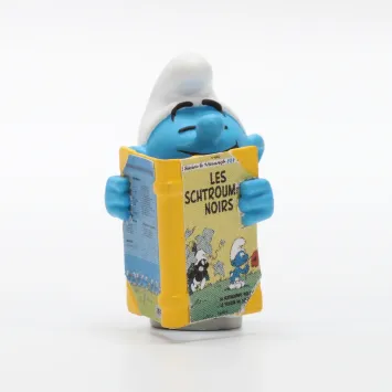 De Smurfen met een stripboeken kist