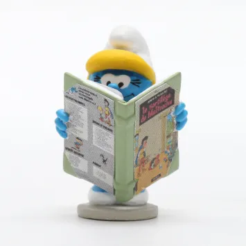 De Smurfen met een stripboeken kist